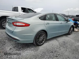 2013 Ford Fusion SE Hybrid z VIN 3FA6P0LU6DR174719, wystawiony jako Copart lot #62877715 z przebiegiem 52 884 mil mil oraz Szkoda całkowita • Salvage title. Historia ofert i sprzedaży dostępna na DreamBid. Obrazek 3.