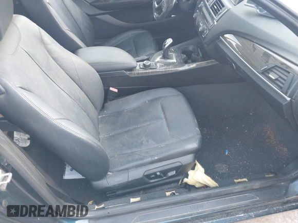 2015 BMW 2 Series 228i with VIN WBA1K5C58FV473737, listed as a IAAI auction lot 42383363 with Not provided miles and . Bid and sale history available at DreamBid. Image 5.