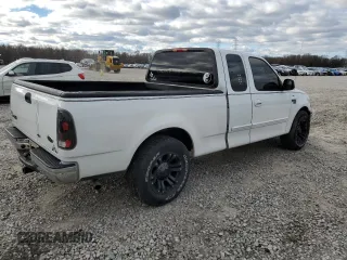 2002 Ford F-150 XL with VIN 1FTRX17W12NA96391, listed as a Copart auction lot 87000064 with 199,867 mi miles and Salvage Title. Bid and sale history available at carsss.com. Image 3.