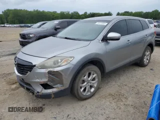 2015 Mazda CX-9 Touring with VIN JM3TB2CAXF0458457, listed as a Copart auction lot 54873565 with 118,890 mi miles and Clean Title. Bid and sale history available at carsss.com. Image 1.