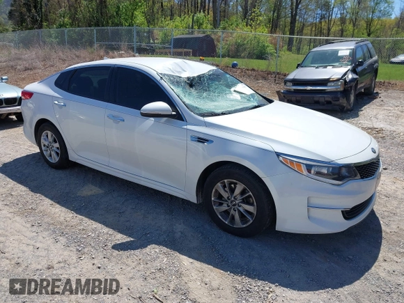 2016 Kia Optima LX z VIN 5XXGT4L3XGG080662, wystawiony jako IAAI lot #42048361 z przebiegiem 99 564 mil mil oraz . Historia ofert i sprzedaży dostępna na DreamBid. Obrazek 1.