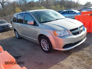 2014 Dodge Grand Caravan SXT with VIN 2C4RDGCG0ER210186, listed as a IAAI auction lot 40813319 with 100,230 mi miles and . Bid and sale history available at DreamBid. Image 1.