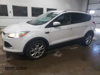 2016 Ford Escape Titanium with VIN 1FMCU9J98GUB51251, listed as a Copart auction lot 64750815 with 206,518 mi miles and Clean title. Bid and sale history available at DreamBid. Image 1.