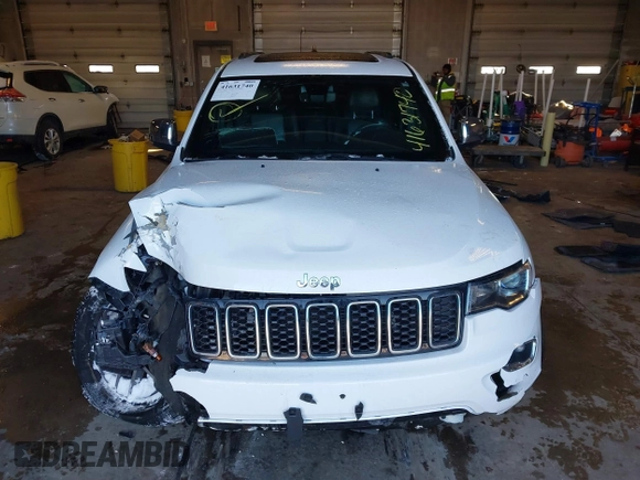 2021 Jeep Grand Cherokee 80th Anniversary with VIN 1C4RJFBG7MC611827, listed as a IAAI auction lot 41631740 with 85,253 mi miles and . Bid and sale history available at DreamBid. Image 13.