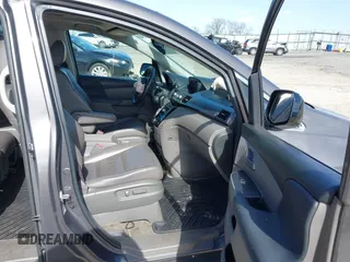 2013 Honda Odyssey EX-L with VIN 5FNRL5H62DB035649, listed as a IAAI auction lot 41849123 with 176,392 mi miles and . Bid and sale history available at carsss.com. Image 5.