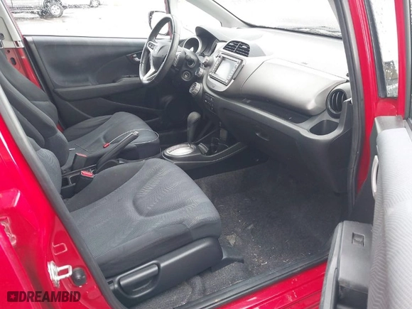 2009 Honda Fit Sport w/Navi with VIN JHMGE88619S009748, listed as a IAAI auction lot 41920104 with 129,532 mi miles. Bid and sale history available at carsss.com. Image 5.