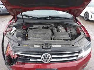 2018 Volkswagen Tiguan S with VIN 3VV1B7AX8JM124827, listed as a IAAI auction lot 41544321 with 101,492 mi miles and . Bid and sale history available at DreamBid. Image 10.