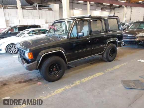 1991 Isuzu Trooper z VIN JACCH58R8M7902476, wystawiony jako IAAI lot #41893980 z przebiegiem 169 269 mil mil oraz . Historia ofert i sprzedaży dostępna na DreamBid. Obrazek 17.