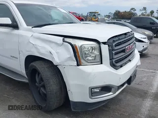 2017 GMC Yukon SLT with VIN 1GKS2BKC9HR125757, listed as a IAAI auction lot 42034182 with 72,333 mi miles. Bid and sale history available at carsss.com. Image 18.