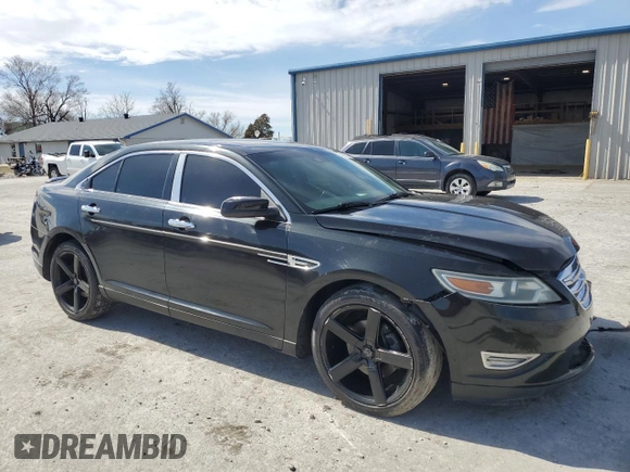 2011 Ford Taurus SHO with VIN 1FAHP2KT0BG142303, listed as a Copart auction lot 48076275 with 217,980 mi miles and Salvage Title. Bid and sale history available at DreamBid. Image 4.