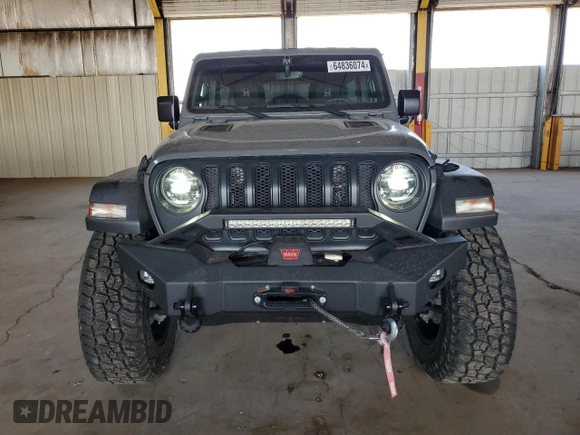 2022 Jeep Wrangler Unlimited High Tide with VIN 1C4HJXDG2NW221829, listed as a Copart auction lot 64836074 with 3,394 mi miles and Salvage Title. Bid and sale history available at DreamBid. Image 5.