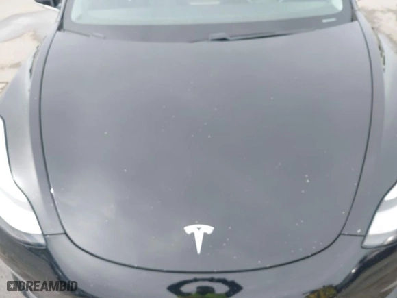 2020 Tesla Model 3 Standard Range Plus with VIN 5YJ3E1EA8LF645569, listed as a IAAI auction lot 41697452 with 84,590 mi miles. Bid and sale history available at carsss.com. Image 10.