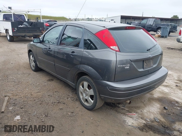 2007 Ford Focus S z VIN 1FAFP37N07W343784, wystawiony jako IAAI lot #42036642 z przebiegiem 223 104 mil mil oraz . Historia ofert i sprzedaży dostępna na DreamBid. Obrazek 3.