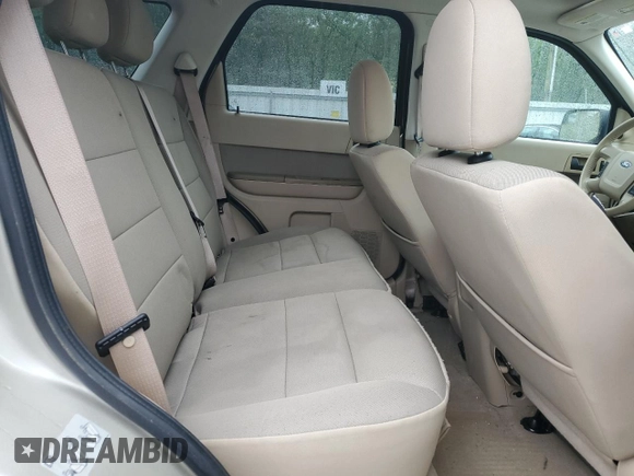 2012 Ford Escape XLT z VIN 1FMCU9DG1CKC74602, wystawiony jako Copart lot #57764325 z przebiegiem 153 872 mil mil oraz Szkoda całkowita • Salvage title. Historia ofert i sprzedaży dostępna na DreamBid. Obrazek 11.