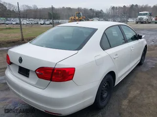 2013 Volkswagen Jetta Sedan S with VIN 3VW2K7AJ2DM293709, listed as a IAAI auction lot 41778918 with 150,492 mi miles. Bid and sale history available at carsss.com. Image 4.