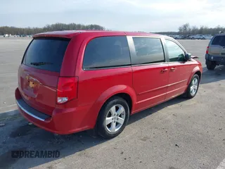 2013 Dodge Grand Caravan SE with VIN 2C4RDGBG9DR723999, listed as a IAAI auction lot 41993367 with 177,549 mi miles and . Bid and sale history available at DreamBid. Image 4.