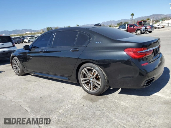 2018 BMW 7 Series 740e xDrive iPerformance with VIN WBA7J2C50JG938505, listed as a Copart auction lot 50485725 with 94,535 mi miles and Salvage Title. Bid and sale history available at carsss.com. Image 2.