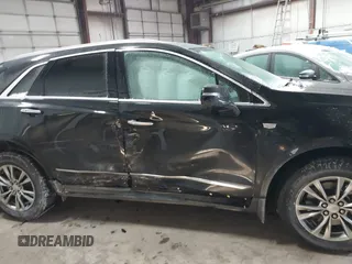 2021 Cadillac XT5 FWD Premium Luxury with VIN 1GYKNCRS3MZ198651, listed as a IAAI auction lot 41607734 with 49,275 mi miles. Bid and sale history available at carsss.com. Image 13.
