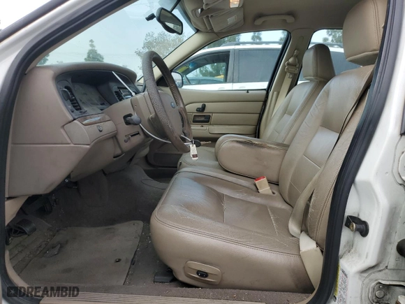 2005 Ford Crown Victoria LX with VIN 2FAFP74W95X124697, listed as a Copart auction lot 86931404 with 303,132 mi miles and Clean Title. Bid and sale history available at carsss.com. Image 7.