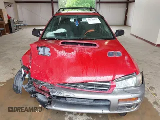 1999 Subaru Impreza Outback Special Sports z VIN JF1GF4854XH815209, wystawiony jako IAAI lot #42235555 z przebiegiem 294 867 mil mil oraz . Historia ofert i sprzedaży dostępna na DreamBid. Obrazek 12.