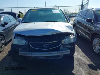 2004 Honda Odyssey EX with VIN 5FNRL18664B051006, listed as a IAAI auction lot 41967247 with 275,047 mi miles and . Bid and sale history available at DreamBid. Image 13.