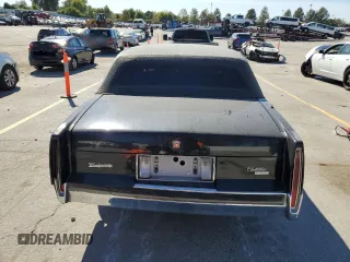 1989 Cadillac DeVille z VIN 1G6CD5151K4329443, wystawiony jako Copart lot #73939314 z przebiegiem 80 129 mil mil oraz Czysty tytuł • Clean title. Historia ofert i sprzedaży dostępna na DreamBid. Obrazek 6.