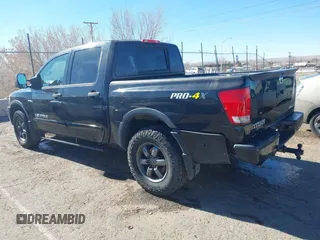 2014 Nissan Titan S with VIN 1N6AA0EC6EN506928, listed as a IAAI auction lot 41380319 with 102,669 mi miles and . Bid and sale history available at DreamBid. Image 3.
