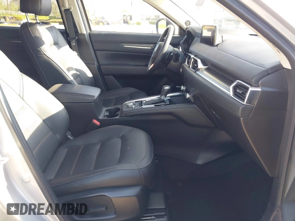 2021 Mazda CX-5 Grand Touring with VIN JM3KFADM1M1393251, listed as a IAAI auction lot 42072862 with 47,758 mi miles. Bid and sale history available at carsss.com. Image 5.