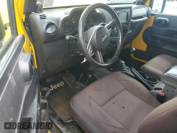2009 Jeep Wrangler X с VIN 1J4FA24169L731334, выставлен на аукционе Copart как лот 61604715 с пробегом 207 807 миль миль и Чистый • Clean title. История ставок и продаж доступна на DreamBid. Изображение 8.