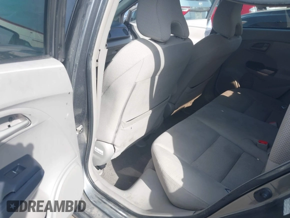 2010 Honda Insight EX with VIN JHMZE2H71AS032532, listed as a IAAI auction lot 41988221 with 333,144 mi miles and . Bid and sale history available at DreamBid. Image 8.