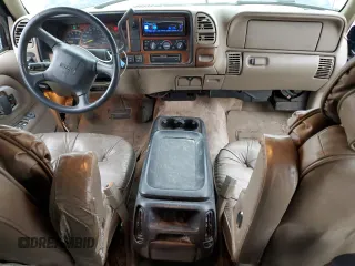 1999 GMC Suburban with VIN 1GDFK16R9XJ771458, listed as a Copart auction lot 43412175 with 159,328 mi miles and Salvage Title. Bid and sale history available at carsss.com. Image 8.