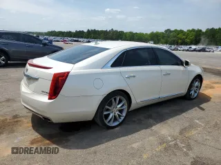2014 Cadillac XTS Luxury z VIN 2G61M5S38E9215641, wystawiony jako Copart lot #53188695 z przebiegiem 97 431 mil mil oraz Szkody całkowita. Historia ofert i sprzedaży dostępna na DreamBid. Obrazek 3.