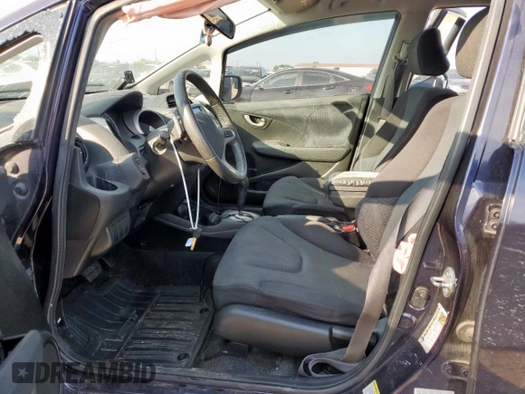2009 Honda Fit Sport z VIN JHMGE88479S009638, wystawiony jako Copart lot #59407455 z przebiegiem Nie podano mil oraz Szkoda całkowita • Salvage title. Historia ofert i sprzedaży dostępna na DreamBid. Obrazek 7.