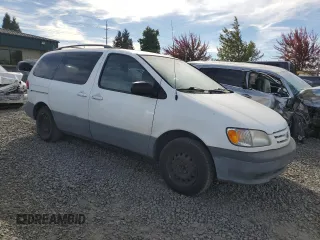 2001 Toyota Sienna LE with VIN 4T3ZF13C61U362980, listed as a Copart auction lot 71986484 with 188,556 mi miles and Salvage Title. Bid and sale history available at carsss.com. Image 4.