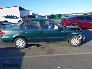 1999 Honda Civic VP with VIN 2HGEJ6614XH564053, listed as a IAAI auction lot 41317610 with 241,757 mi miles. Bid and sale history available at carsss.com. Image 14.