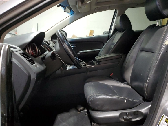 2012 Mazda CX-9 Touring z VIN JM3TB3CV5C0347593, wystawiony jako Copart lot #55675705 z przebiegiem 179 777 mil mil oraz Szkody całkowita. Historia ofert i sprzedaży dostępna na DreamBid. Obrazek 7.