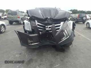 2018 Cadillac Escalade Luxury z VIN 1GYS3BKJ7JR204609, wystawiony jako IAAI lot #40951011 z przebiegiem 79 335 mil mil oraz . Historia ofert i sprzedaży dostępna na DreamBid. Obrazek 6.