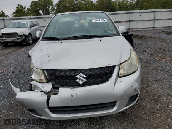 2009 Suzuki SX4 Man FWD with VIN JS2YC412396201554, listed as a Copart auction lot 72902194 with 135,355 mi miles and Salvage Title. Bid and sale history available at carsss.com. Image 5.