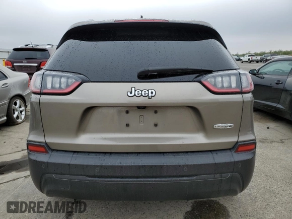 2021 Jeep Cherokee Altitude with VIN 1C4PJLLB3MD169129, listed as a Copart auction lot 82715734 with 59,468 mi miles and Salvage Title. Bid and sale history available at carsss.com. Image 6.