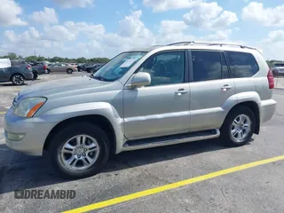 2003 Lexus GX with VIN JTJBT20X530002434, listed as a IAAI auction lot 42176772 with 140,226 mi miles. Bid and sale history available at carsss.com. Image 14.