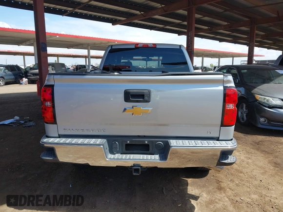 2016 Chevrolet Silverado 1500 LT with VIN 1GCRCREC3GZ185219, listed as a IAAI auction lot 41970474 with 124,101 mi miles and . Bid and sale history available at DreamBid. Image 17.