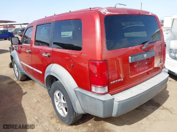2007 Dodge Nitro SXT with VIN 1D8GU28K37W728795, listed as a IAAI auction lot 41676776 with 104,498 mi miles. Bid and sale history available at carsss.com. Image 3.