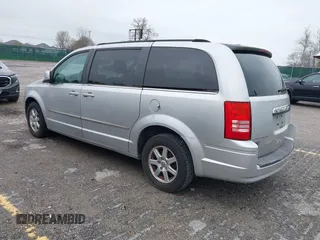 2010 Chrysler Town & Country Touring z VIN 2A4RR5D12AR265985, wystawiony jako IAAI lot #41970445 z przebiegiem 125 635 mil mil oraz . Historia ofert i sprzedaży dostępna na DreamBid. Obrazek 3.
