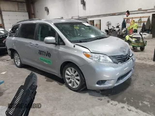2013 Toyota Sienna LE with VIN 5TDJK3DC0DS056429, listed as a IAAI auction lot 41633193 with 167,321 mi miles and . Bid and sale history available at DreamBid. Image 1.