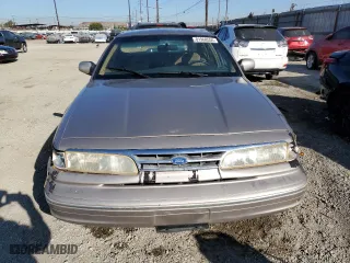 1995 Ford Crown Victoria LX with VIN 2FALP74W7SX106035, listed as a Copart auction lot 81968554 with 64,150 mi miles and Clean Title. Bid and sale history available at carsss.com. Image 5.