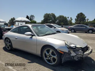 2003 Porsche 911 with VIN WP0BA29923S635457, listed as a Copart auction lot 61446545 with 85,602 mi miles and Salvage title. Bid and sale history available at DreamBid. Image 4.