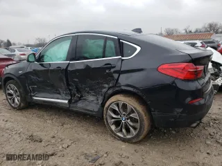 2015 BMW X4 xDrive28i with VIN 5UXXW3C58F0M87154, listed as a Copart auction lot 69211092 with 147,960 mi miles. Bid and sale history available at carsss.com. Image 2.