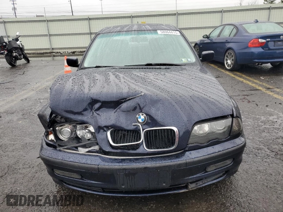 2000 BMW 3 Series 323i with VIN WBAAM3340YFP70049, listed as a Copart auction lot 58064415 with 122,574 mi miles and Clean title. Bid and sale history available at DreamBid. Image 5.
