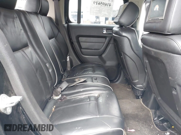2008 Hummer H3 SUV Alpha with VIN 5GTEN63L388197946, listed as a IAAI auction lot 41695619 with 198,631 mi miles. Bid and sale history available at carsss.com. Image 8.