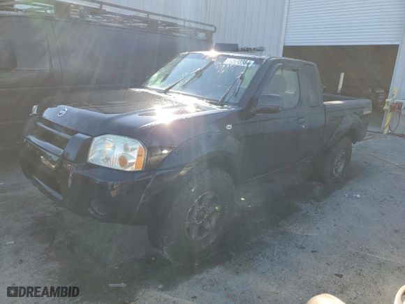 2004 Nissan Frontier 2WD XE Desert Runner with VIN 1N6ED26T44C434897, listed as a Copart auction lot 82699384 with 290,295 mi miles and Salvage Title. Bid and sale history available at carsss.com. Image 1.